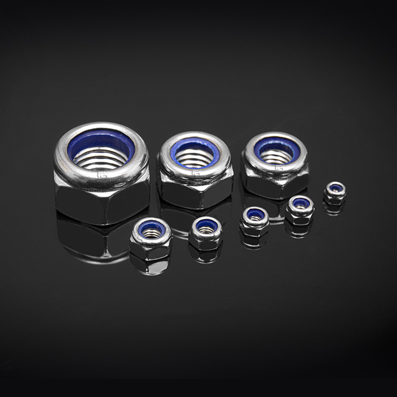 DIN 985 স্টেইনলেস স্টীল প্রচলিত টর্ক টাইপ হেক্সাগন পাতলা বাদাম ননমেটালিক সন্নিবেশ সহ